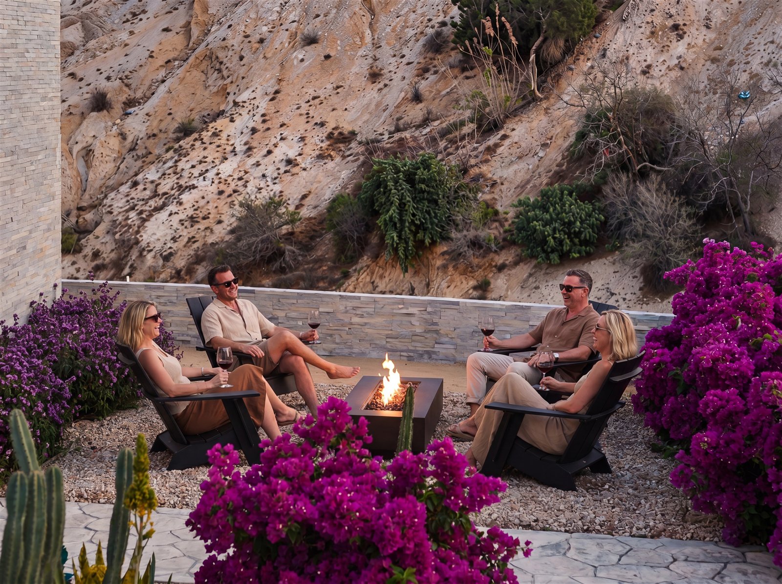 Residents gathering around the fire pit at Loma Escondida